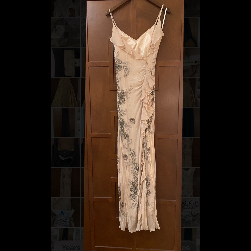 Woman’s pale pink evening gown, sexy back